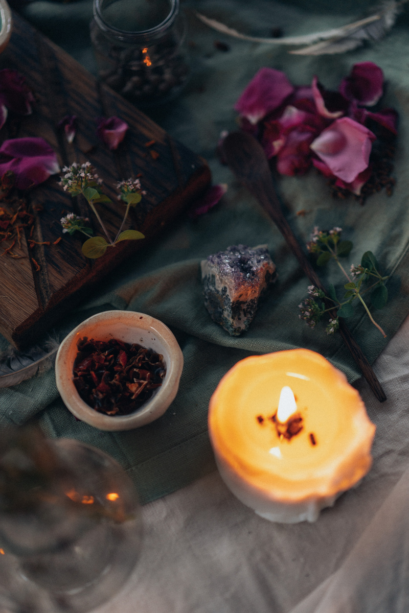 Dried Flowers and Lighted Candle